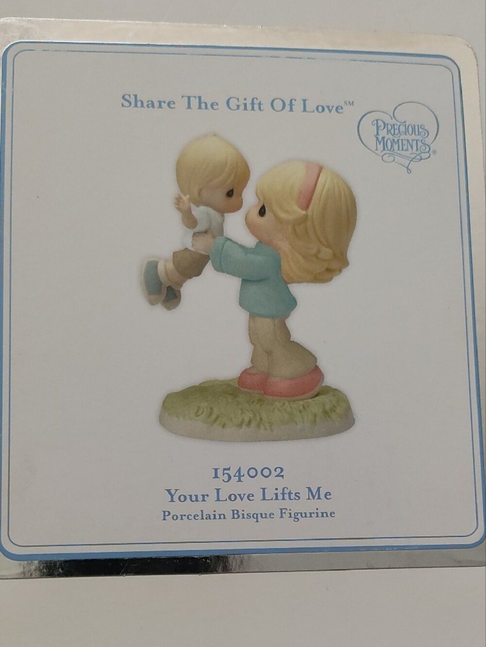 Precious Moments Blonde Girl Figurine in Pastel Blue and Pink